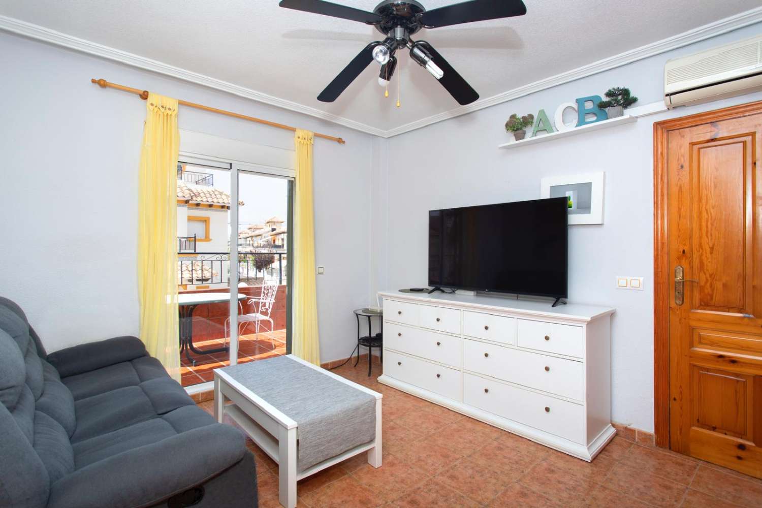 Top floor bungalow with terrace, garden and communal pool