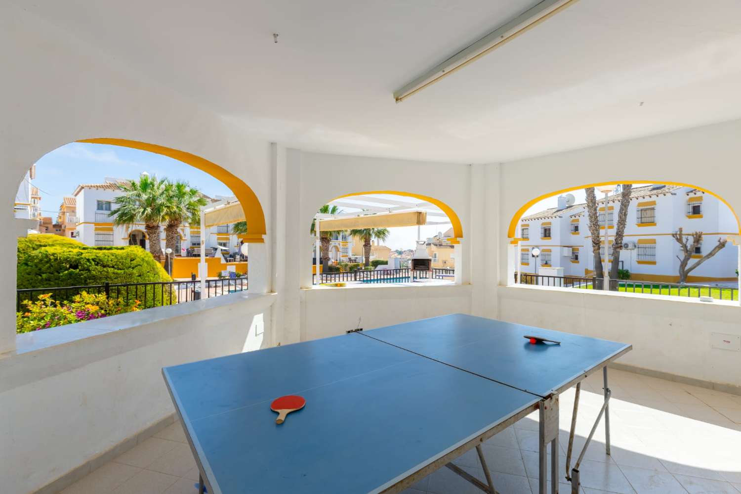 Ground floor bungalow with communal pool