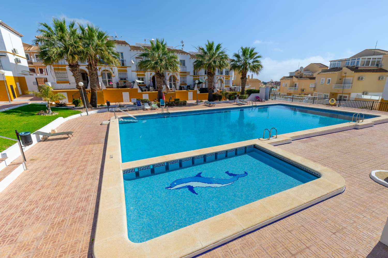 Ground floor bungalow with communal pool