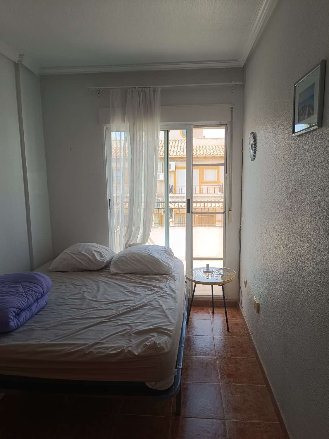 Vendu/Superbe maison de ville rénovée avec garage et solarium à Punta Prima